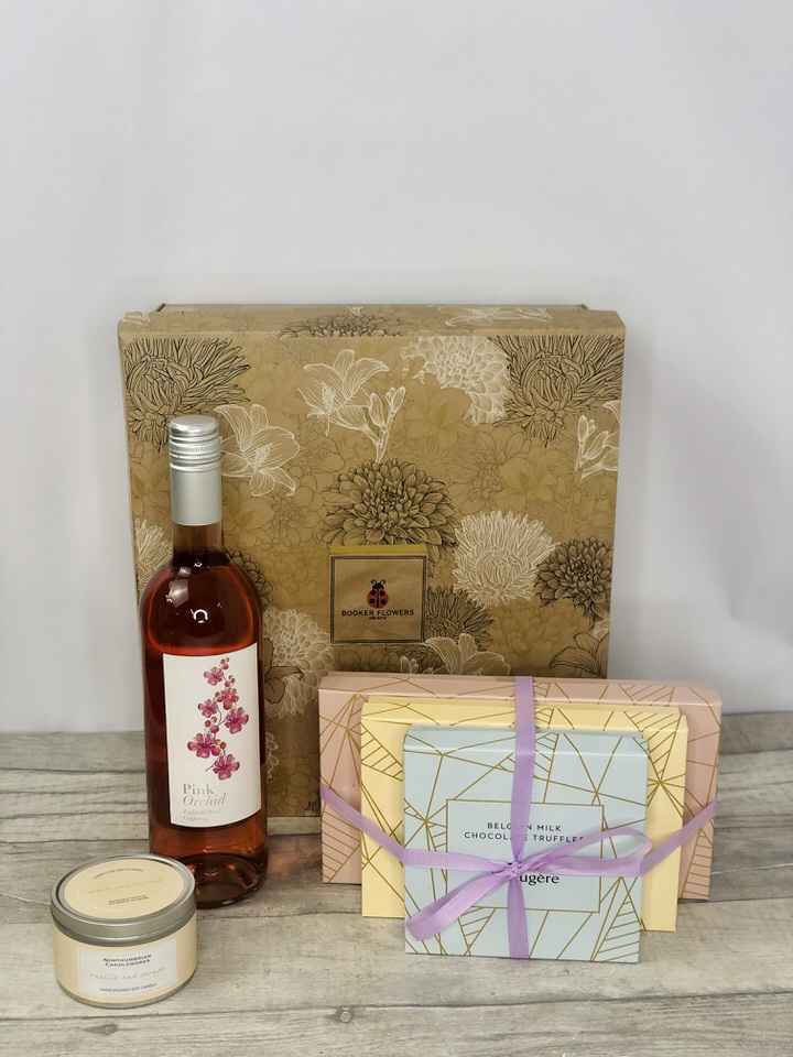 <p>Order this Girls Best Friend Gift Set to celebrate any occasion and you will not be disappointed.  Containing, a bottle of Rose Wine, three boxes of Maison Fougere Chocolates, Truffles and Salted Caramels together with an eco-friendly Soy Scented Candle beautifully presented in a stylish Gift Box.</p>
<br>
<h2>Gift Delivery Coverage</h2>
<p>Our shop delivers flowers and gifts to the following Liverpool postcodes L1 L2 L3 L4 L5 L6 L7 L8 L11 L12 L13 L14 L15 L16 L17 L18 L19 L24 L25 L26 L27 L36 L70 ONLY.  If your order is for an area outside unfortunately we cannot process your order because of the difference in stock at other florists.</p>
<br>
<h2>Alcohol Gifts</h2>
<p>As a licensed florist, we are able to supply alcoholic drinks either as a gift on their own or with flowers. We have carefully selected a range that we know you will love either as a gift in itself or to provide that extra bit of celebratory luxury to a floral gift.</p>
<p>This Gift Set contains a 75cl bottle of Pink Orchid Zinfandel Rose Wine together with a box of 170g Maison Fougere Salted Caramels, a box of 140g Maison Fougere Milk Chocolate Truffles, a box of 115g Maison Fougere Belgian Chocolates, and a locally made eco-friendly Northumbrian Scented Soy Candle in a stylish tin.</p>
<p>Have this giftset delivered to someone special to celebrate as an alternative to having flowers delivered, or have it delivered with your flowers to really celebrate!</p>
<br>
<h2>Online Gift Ordering | Online Gift Delivery</h2>
<p>Through this website you can order 24 hours, Booker Gifts and Gifts Liverpool have put together this carefully selected range of Flowers, Gifts and Finishing Touches to make Gift ordering as easy as possible. This means even if you do not live in Liverpool we make it easy for you to see what you are getting when buying for delivery in Liverpool.</p>
<br>
<h2>Liverpool Flower and Gift Delivery</h2>
<p>We are open 7 days a week and offer advanced booking flower delivery, same-day flower delivery, Guaranteed AM Flower Delivery and also offer Sunday Flower Delivery.</p>
<p>Our florists Deliver in Liverpool and can provide flowers for you in Liverpool, Merseyside. And through our network of florists can organise flower deliveries for you nationwide.</p>
<br>
<h2>Beautiful Gifts Delivered | Best Florist in Liverpool</h2>
<p>Having been nominated the Best Florist in Liverpool by the independent Three Best Rated for the 5th year running you can feel secure with us</p>
<p>You can trust Booker Gifts and Gifts to deliver the very best for you.</p>
<br>
<h2>5 Star Google Review</h2>
<p><em>So Pleased with the product and service received. I am working away currently, so ordered online, and after my own misunderstanding with online payment, I contacted the florist directly to query. Gemma was very prompt and helpful, and my flowers were arranged easily. They arrived this morning and were as impactful as the pictures on the website, and the quality of the flowers and the arrangement were excellent. Great Work! David Welsh</em></p>
<br>